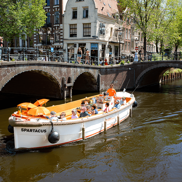 Lovely Cruises boat in summer with bridge